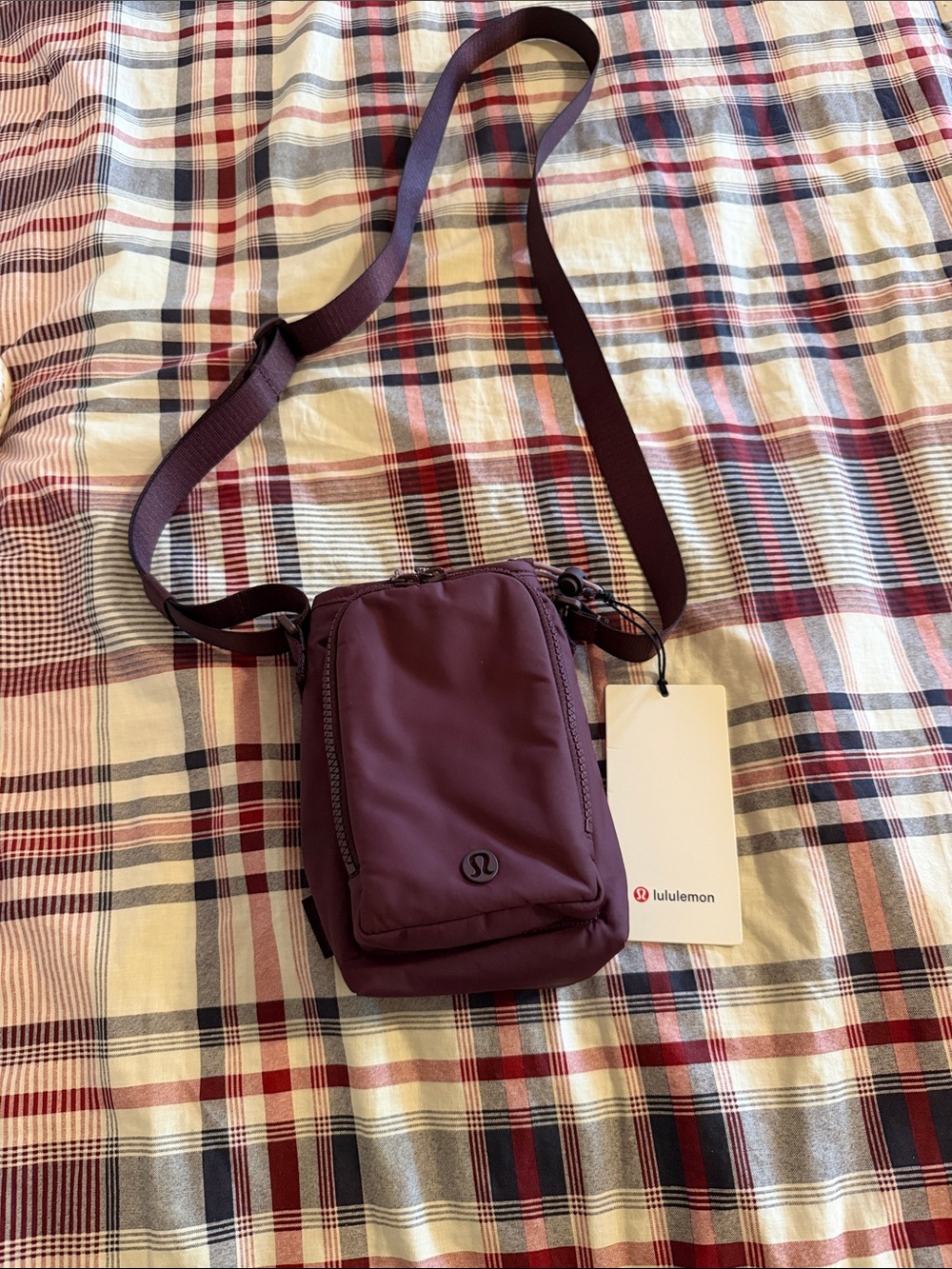 NWT lululemon  Small Crossbody Water bottle Bag in Deep Plum